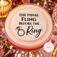 Load image into Gallery viewer, Final Fling Before the Ring Edible Cocktail Toppers on a pink cocktail with decorative ring design.
