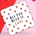 Load image into Gallery viewer, Valentine's Day coasters with charming hearts and text 'All You Need Is Love' for romantic celebrations.
