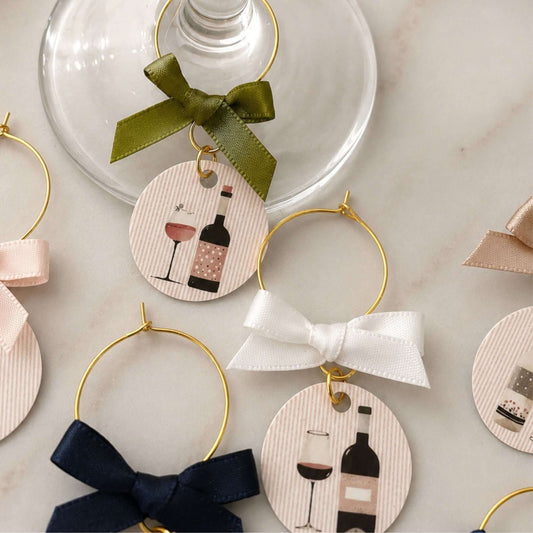 Wine Time Glass Charms Set Of 6 featuring colorful ribbon bows and unique wine-themed designs.