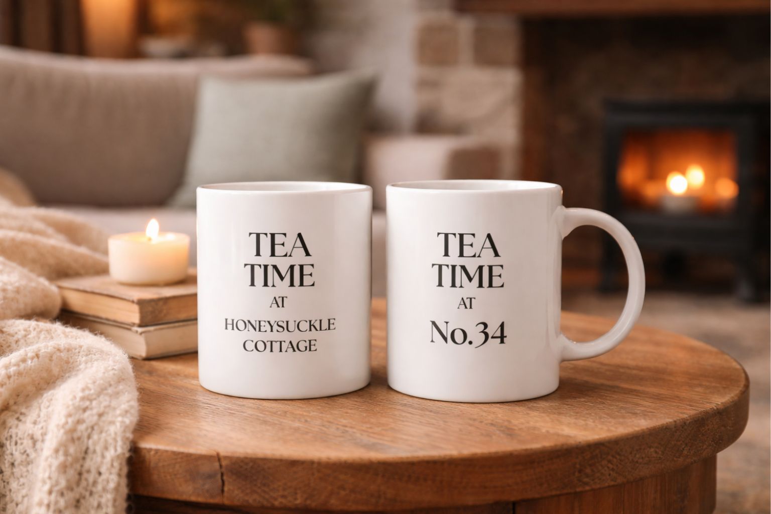 Two white mugs with 'TEA TIME' text on a wooden table in a cozy room with a fireplace.